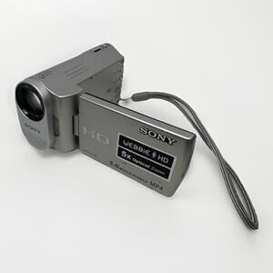 Sony MHS-CM1 Webbie Camcorder 5.0 Mega Pixels MP4 5X Silver No Charger WorksC117